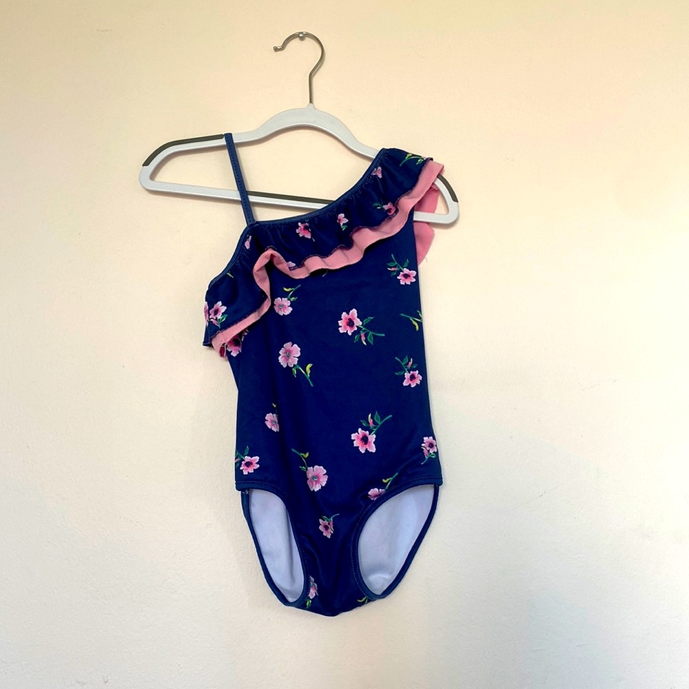 Blue girls swimsuit with pink floral pattern